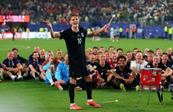 Soccer-Ecstatic Norway squad celebrate World Cup progress with Viking row