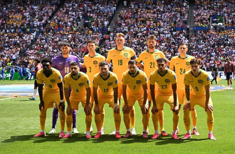 Soccer-Australia, Paraguay plot path to knockout phase in Bay Area battle