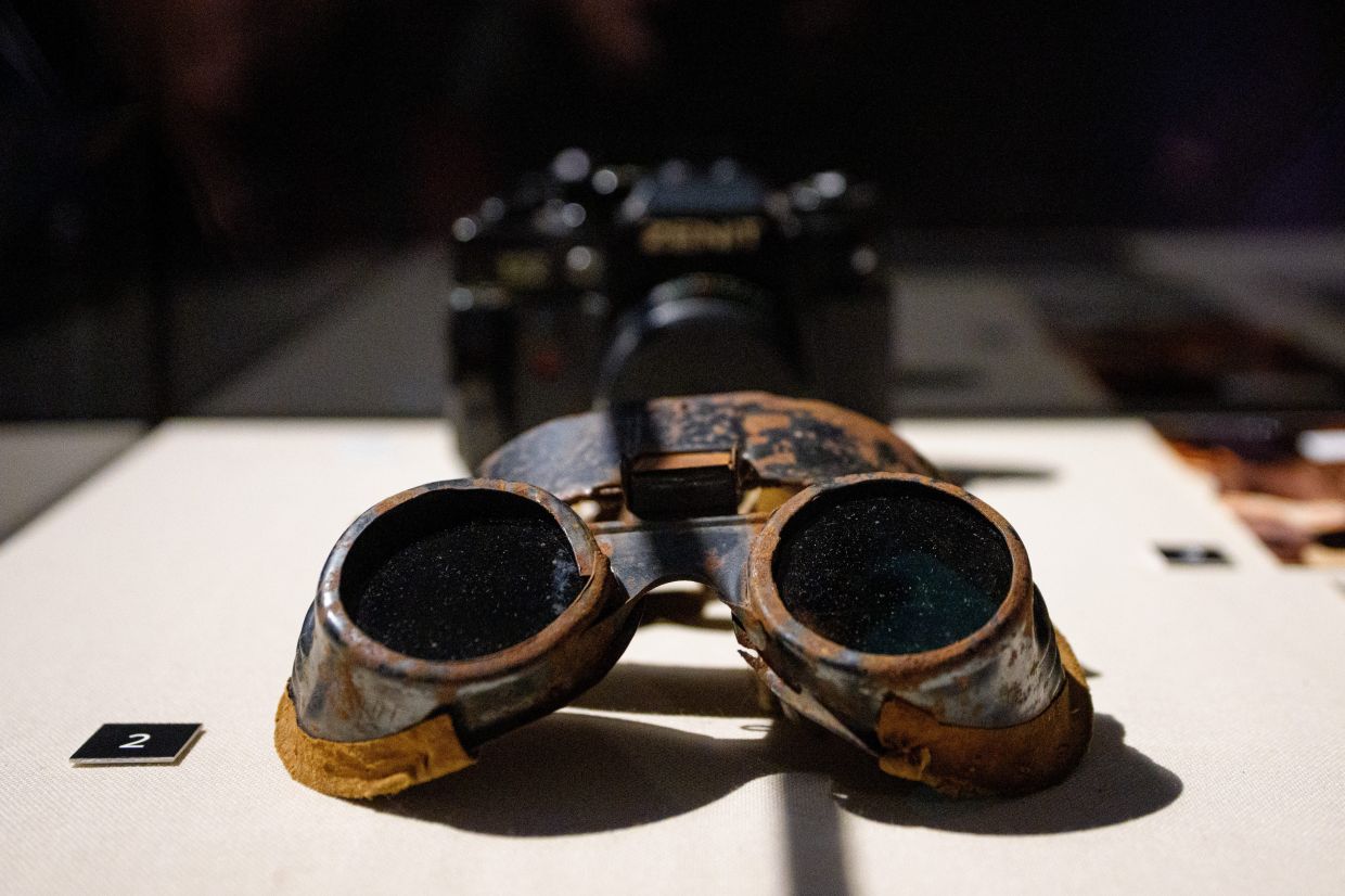 Opaque glasses used to block detainees' vision and communist era surveillance equipment are on display at the exhibition. Photo: AP