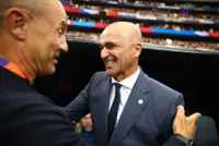 Soccer-Portugal played with heads not hearts against Uzbekistan, coach says