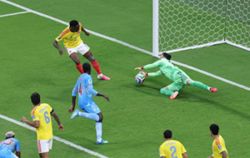 Soccer-Munoz sends Colombia into World Cup last 32 with win over DR Congo