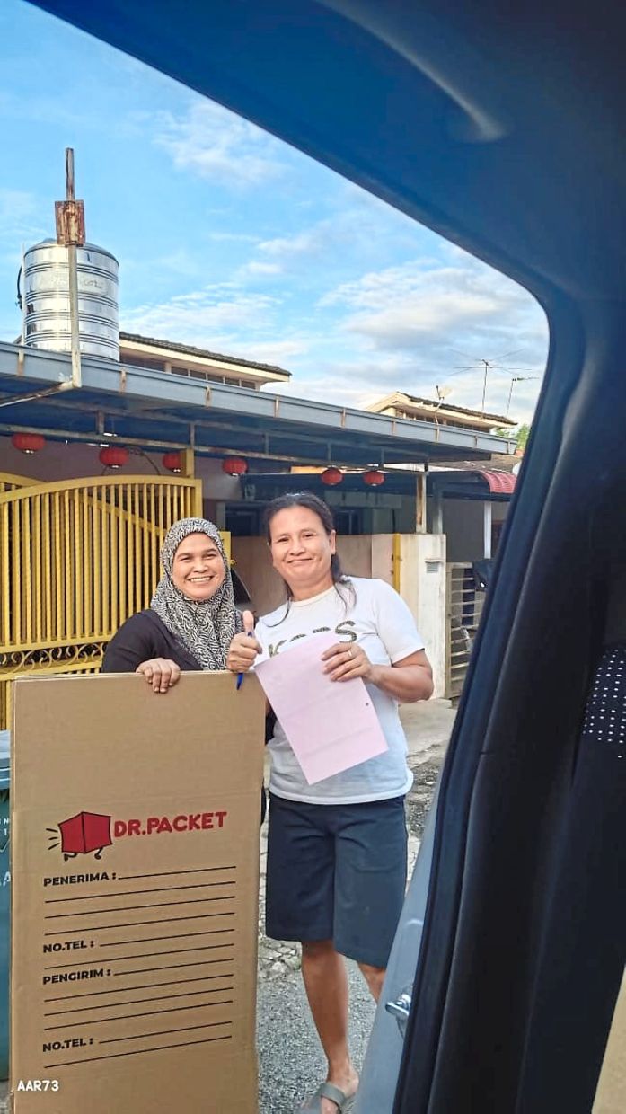 Zuraida started her own courier services to support her family. Photo: Zuraida Abdul Rahman