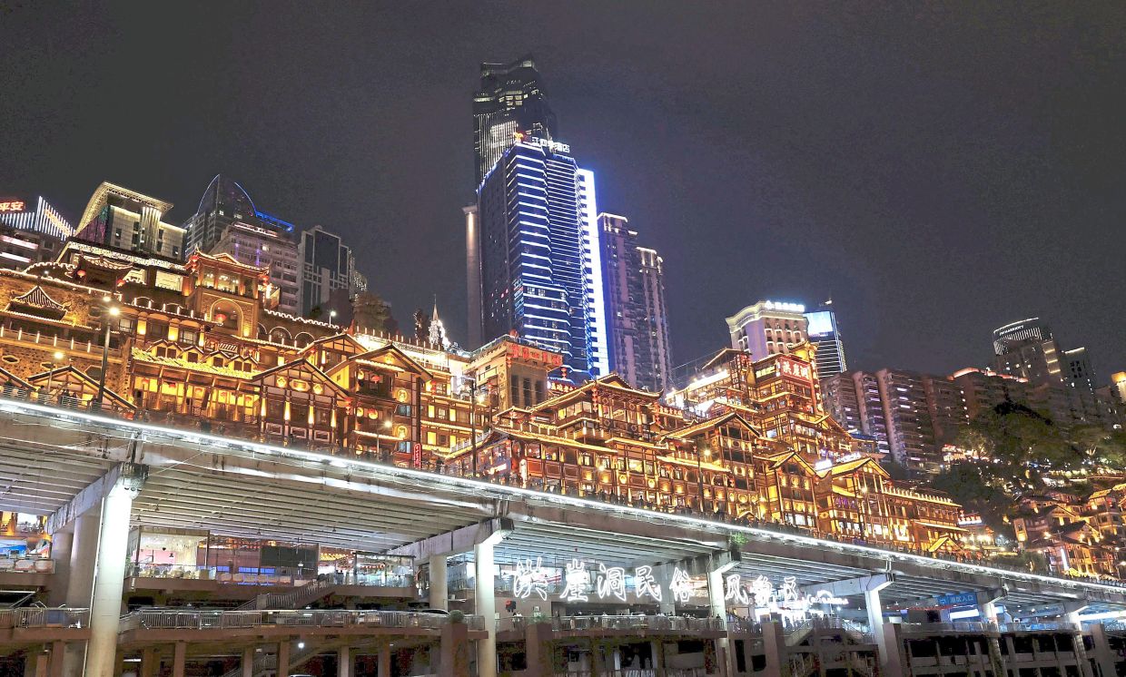 Hongyadong is one of Chongqing’s most famous tourist attractions, located along the banks of the Jialing River. — NG KOK LEONG/The Star