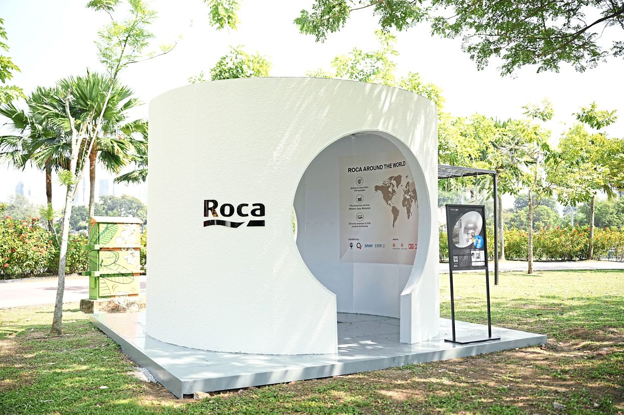 Frame A Roca by OTWO1 Architects and partner Roca Malaysia is a 'circular drum' at Titiwangsa Lake that opens up a portal to the Kuala Lumpur skyline.