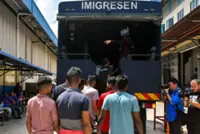 270 foreign workers held in immigration dragnet at two factories