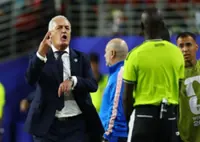 Soccer-Paraguay coach rails against mandatory cooling breaks, says 'continuity is broken'