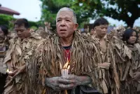 Philippine devotees honour St. John the Baptist with mud-covered display of faith