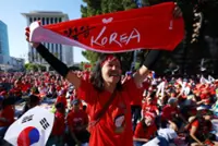 Soccer-'Keeping Our Roots Eternal': Korean Americans celebrate home at World Cup