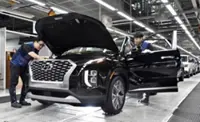 South Korea's Hyundai auto workers vote to back strike action