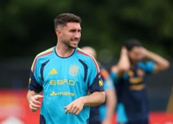 Soccer-Unbeaten Spain ready for whatever Uruguay throw at them, Laporte says