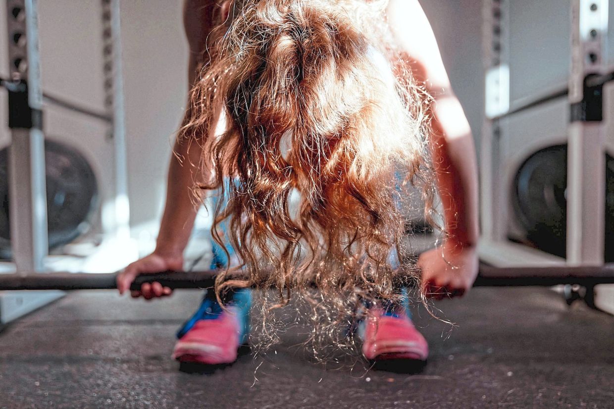 Lucy holds three US records in powerlifting. Photo: The New York Times
