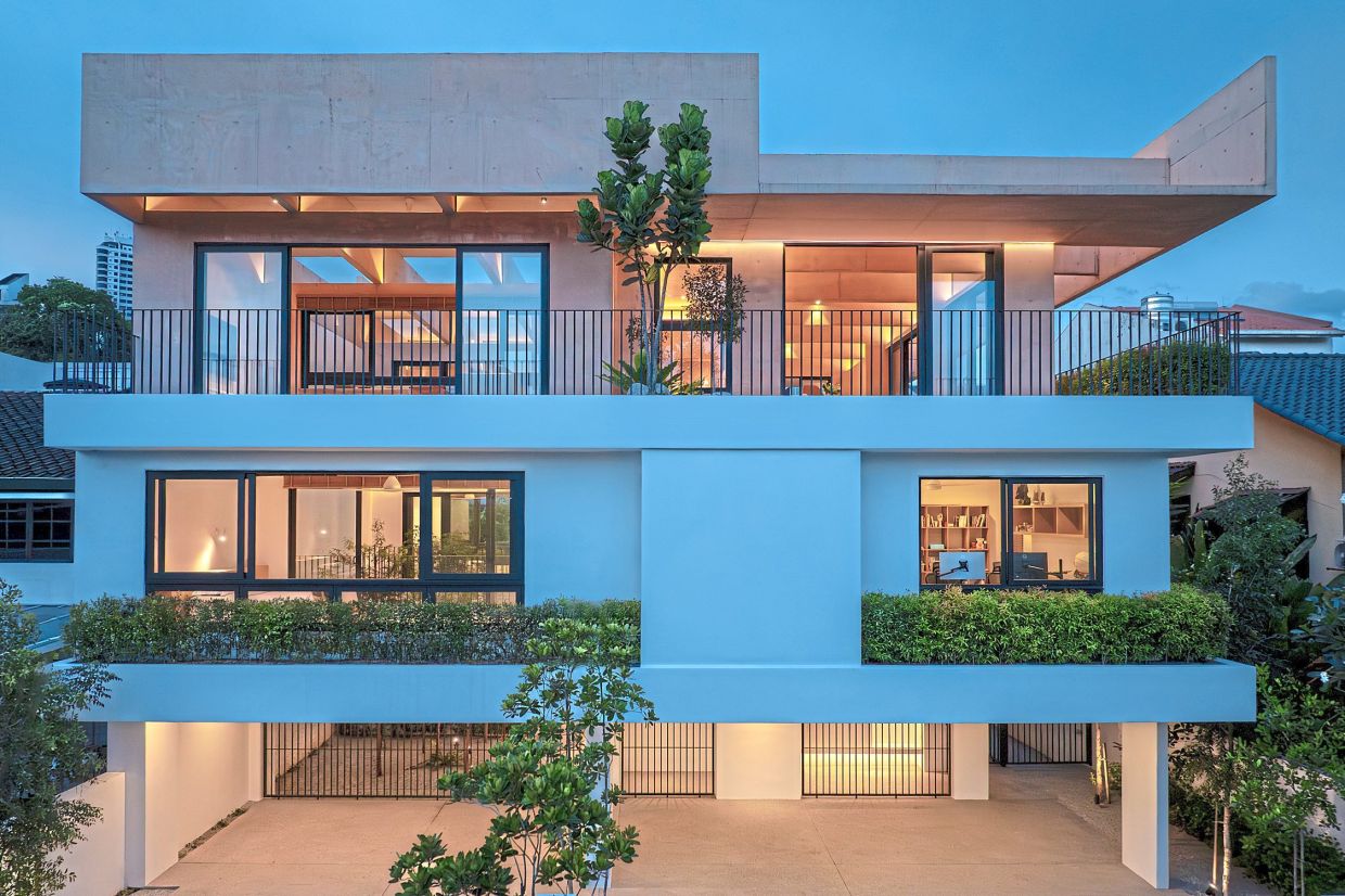 Exterior night view of Armoua House.