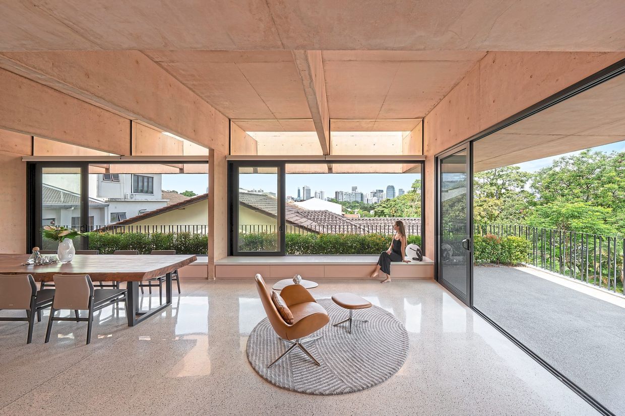 The upper levels are embraced by greenery while offering a view of the surroundings.
