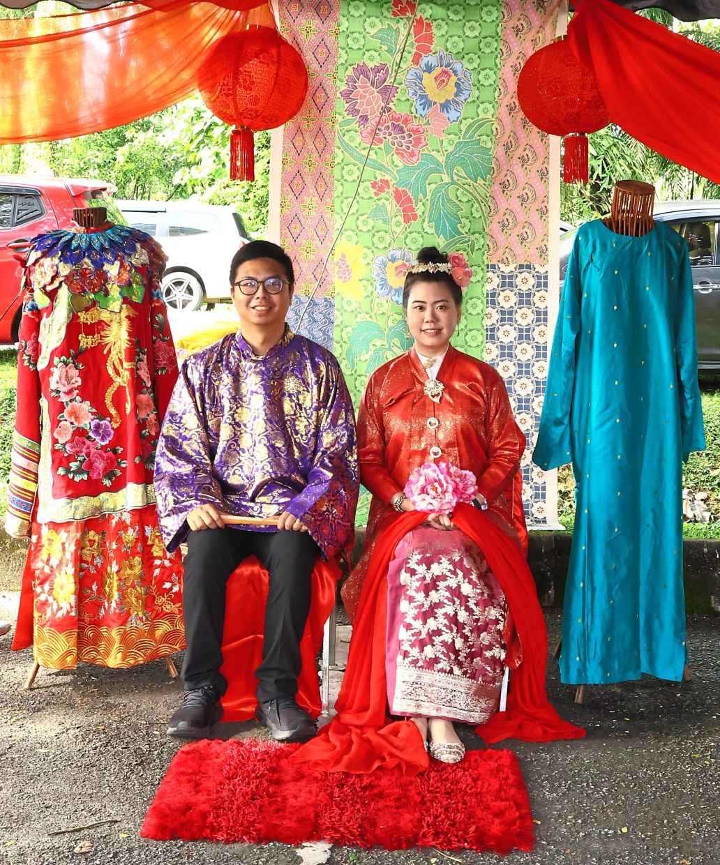 A pair highlight the richness of a Baba Nyonya wedding ceremony.