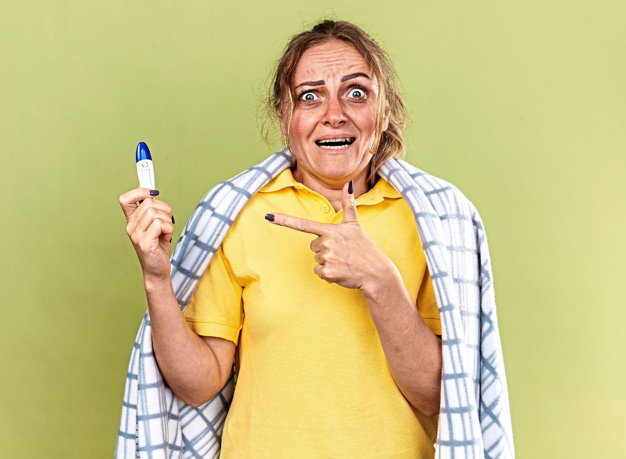While pregnancy is biologically impossible post-menopause, at-home and clinical urine tests can occasionally turn up positive, alarming the woman. — Magnific