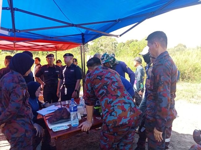 Fire and Rescue personnel during search operations. - Photo: FRD