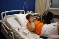 In sweltering French hospital, air-conditioned waiting room offers some relief