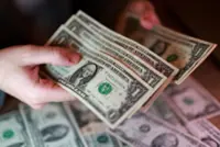Oil slide softens dollar’s inflationary bite