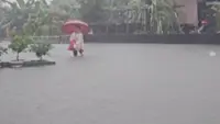 Torrential rain from passing storm shuts down parts of Taiwan and Japan