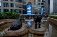 Hong Kong listing debutants jump as Hang Seng falls; Apple supplier Lingyi up 3%