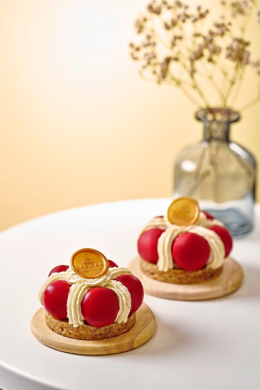 Lychee St Honore is a classic French-based choux puff cake with lychee fruit. 