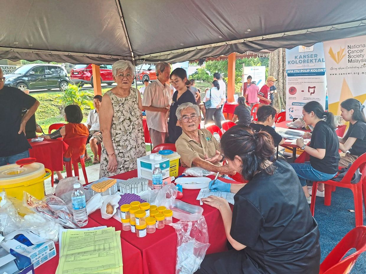 Chua (seated, centre) getting a health check at the 2025 event by SS20 Central Zone RA funded by the community grant initiative. — Courtesy of SS20 Central Zone RA