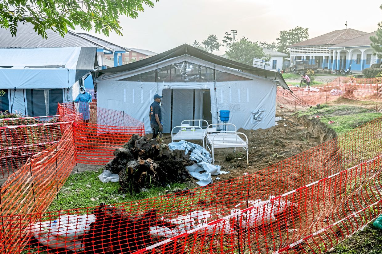 Tents serving as isolation spaces stand at the main hospital in Bunia, as part of the response to the Ebola outbreak in the Democratic Republic of the Congo, May 23, 2026. The deadly virus has spread alarmingly in Congo for months. Only now is the response taking shape. (Arlette Bashizi/The New York Times)