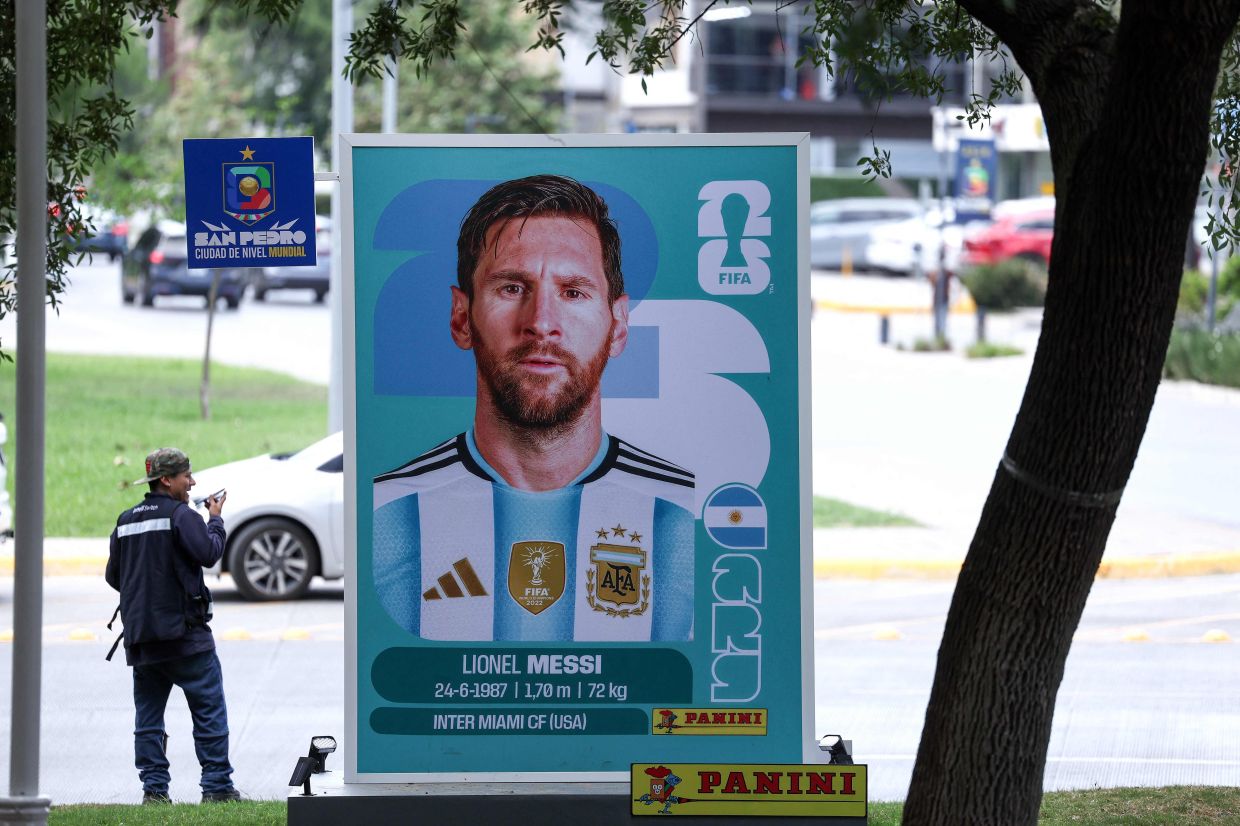 A giant Panini sticker depicting Argentina's forward Lionel Messi is pictured on a street in San Pedro Garza Garcia, near Monterrey, Mexico. Photo: AFP 
