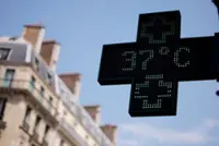 French city-dwellers swap stifling apartments for cool hotel rooms