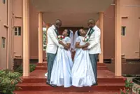 Twin brothers married twin sisters in a rare double wedding In Nigeria
