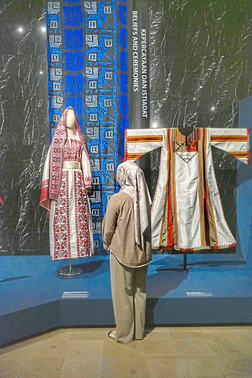 The exhibition in KL features over 100 historical thobe dresses and accessories, giving Malaysians a glimpse of ancient Palestinian craft and culture. Photo: The Star/Raja Faisal Hishan 