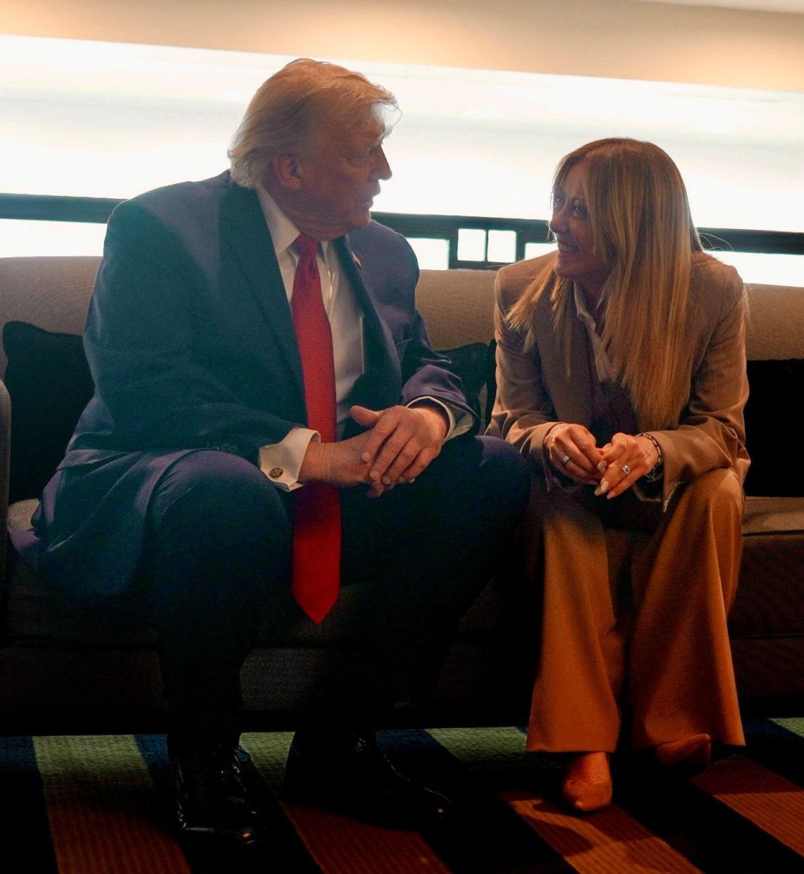 He says, she says: The US president speaking to Meloni on the sidelines of the G7 Summit. — Reuters