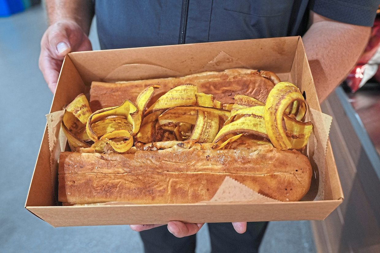 ‘Pan con Lechon’ is a Cuban-style sandwich, and served with fresh mariquitas or plantain chips at Miami Stadium.