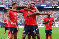 Soccer-Bellingham and Kane shine as England sink Panama to top group