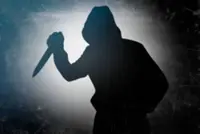 Alleged wife slasher surrenders to police