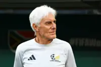 Soccer-South Africa eye more World Cup magic as wife says Broos can stay