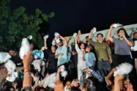 Cakes, diapers and lectures: Protesting ‘cockroaches’ dig in their heels in India