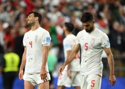Soccer-In Seattle thank-you note, Iran express frustrations over draw with Egypt