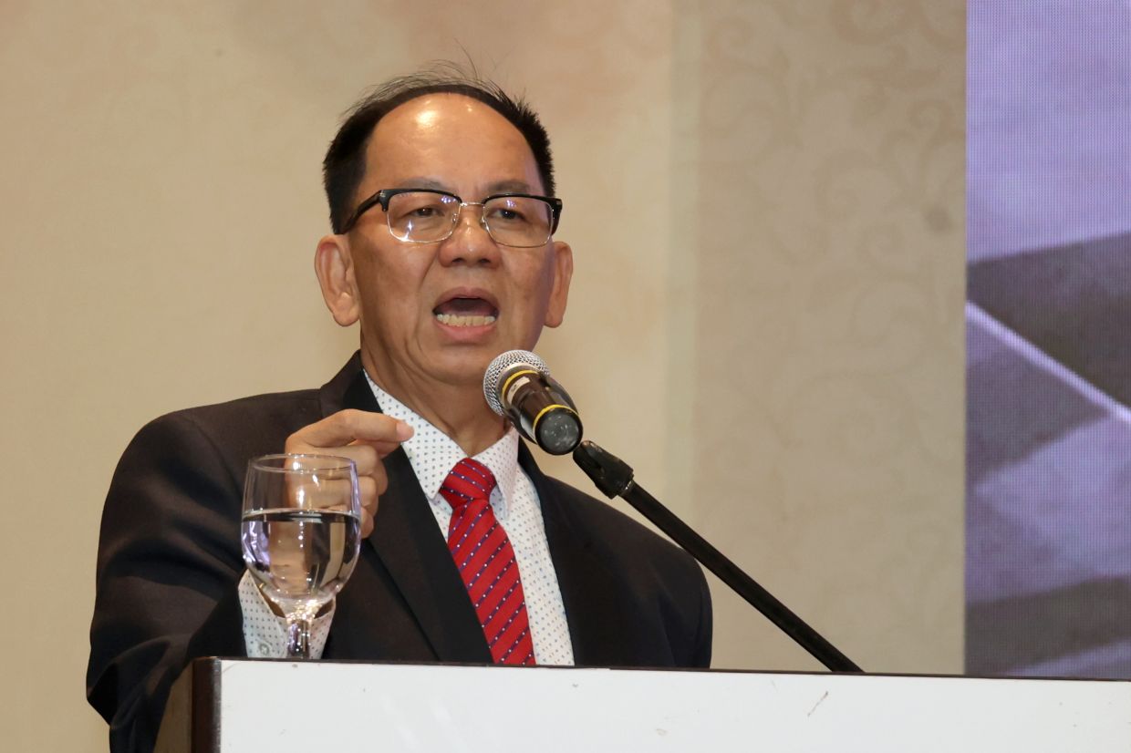 Federation Of Motor and Credit Companies Associations of Malaysia (FMCCAM) president Datuk Tony Khor delivering his speech during the FMCCAM's 45th annual general meeting at Berjaya Hotel, Penang. ( May 28, 2023 ) — CHAN BOON KAI/The Star