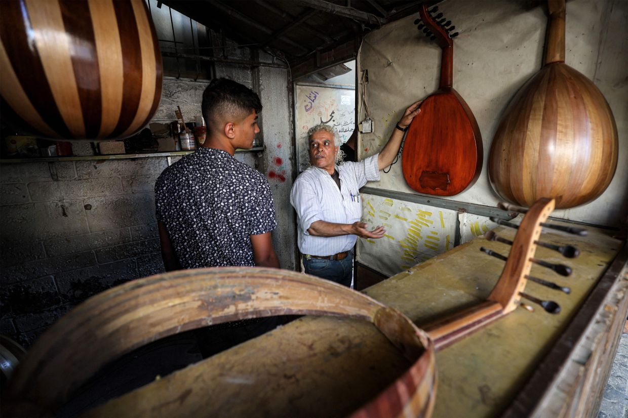 With no proper workshop, scarce materials and frequent power shortages, Suhail Abu Shawish relies almost entirely on hand tools. Photo: AFP 