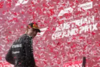 Motor racing-Russell ends long wait with 'cold-blooded' win