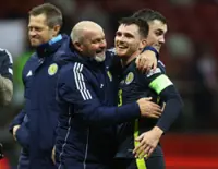 Soccer-Robertson hails Clarke's Scotland legacy as reign ends after World Cup exit