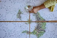 On Greek island of Santorini, winemakers try to adapt to heat and drought