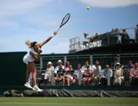 Tennis-Chwalinska tumbles out of Wimbledon after fall on match point