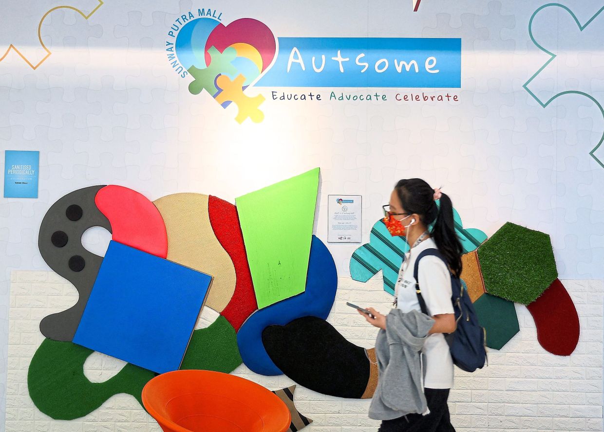 A shopper passing by sensory elements made under Sunway Malls’ Autsome initiative to raise awareness and provide a safe, accommodating environment for individuals on the autism spectrum.
