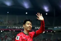 Soccer-Son apologises after South Korea's early World Cup exit, urges fans to support team