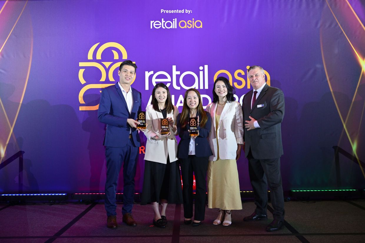(From left) Guardian Malaysia head of omnichannel Eugene Wong, health and beauty e-commerce lead Jill Ng, Anna and Wu posing for a group photo.
