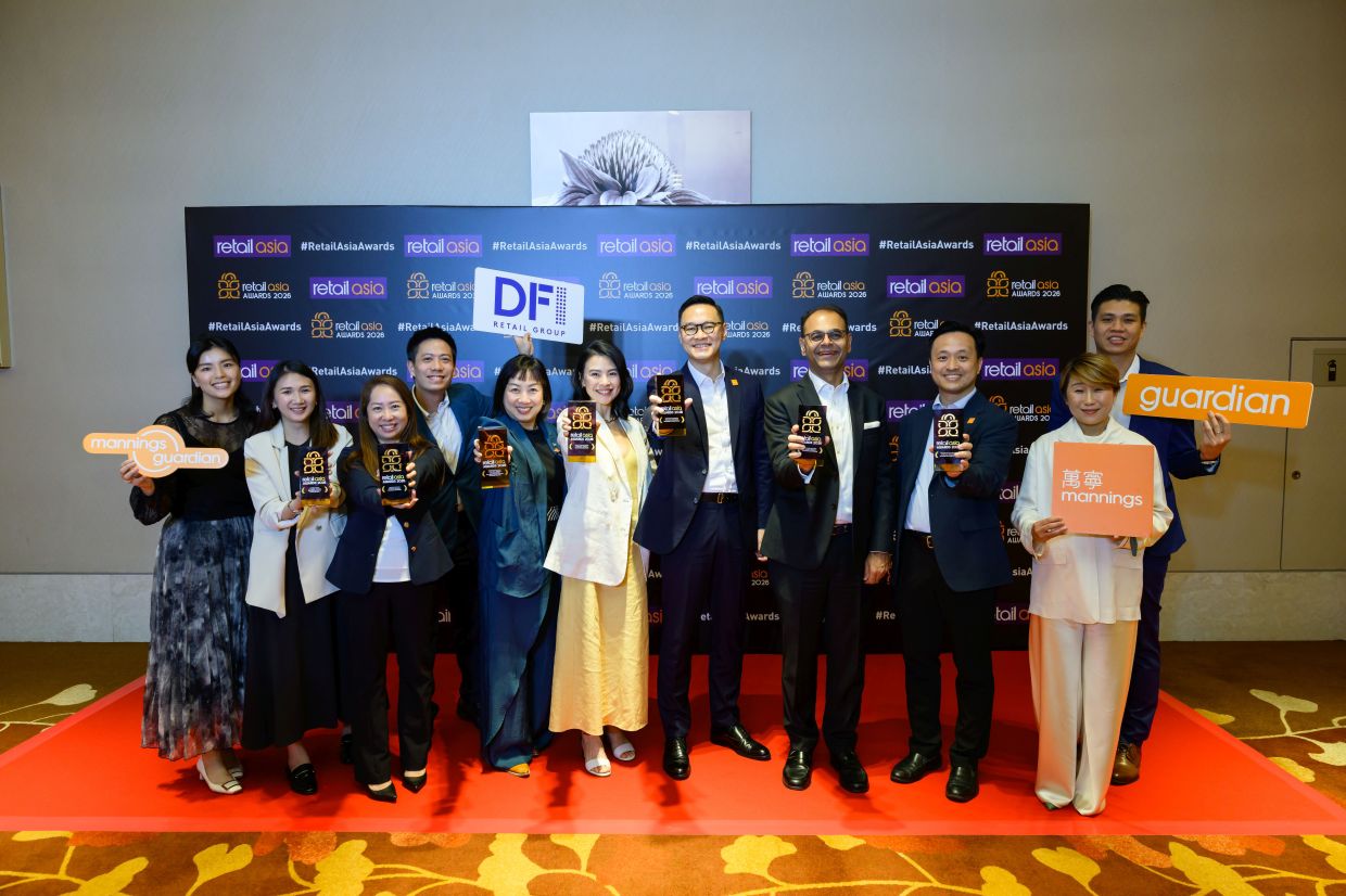 Wu (sixth from left) with Guardian Malaysia, Singapore and Brunei brand and marketing director Anna Ng (third from left) together with other DFI Retail Group’s colleagues from across the Asia Pacific at the Retail Asia Awards 2026 award presentation ceremony.