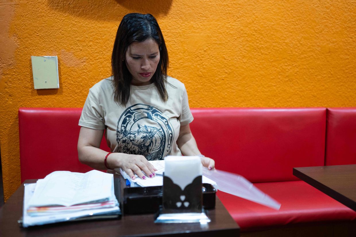 Budhathoki Samjhana came to Japan as a student in 2016 and saved for years to open her first restaurant in 2023. - AFP