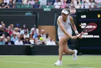 Tennis-Second seed Rybakina survives three-set scare against debutant Boisson